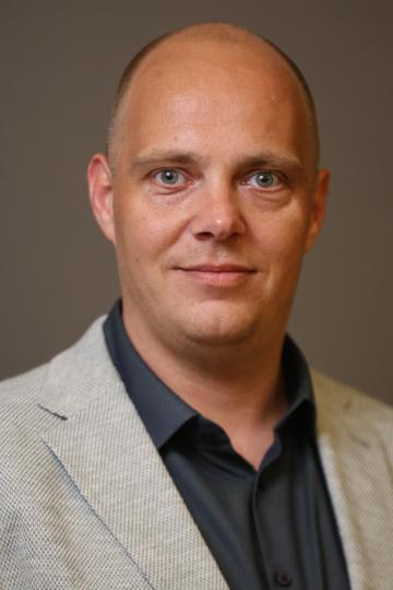 Portret René Karens